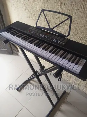Quality Keyboard Piano With Stand and Adapter