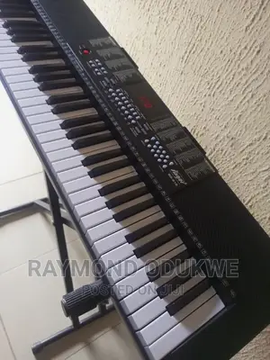 Quality Piano Keyboard With Adapter and Stand