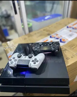 Playstation 4 + Extra Controller and Full Accessories Intact