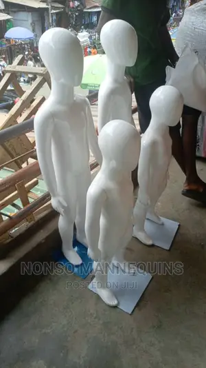 Glossy White Children Mannequins Of A Different Ages