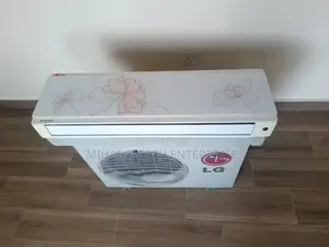 1.5HP LG Air-Conditioner, Sleek Glass Design