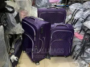 Set of Purple Swiss Polo Travel Luggage
