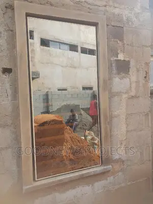 Cream Frameless Window With Burglary
