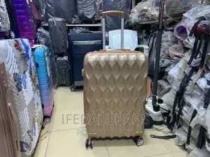 Medium Size Gold Colour Plastic Travel Luggage