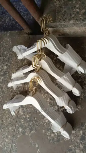 Gold Metal Head and White Body Wooden Hangers