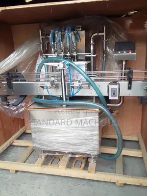 Automatic Four Nozzle Filling Machine