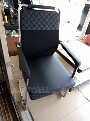 Leather Visitors Chair With Armrest.