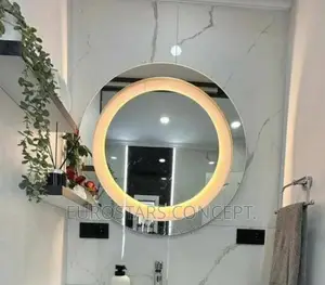 Round Mirror With Yellow Sensor Lights