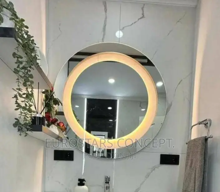 Round Mirror With Yellow Sensor Lights
