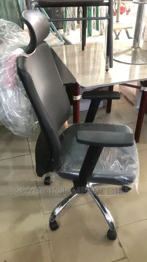An Executive Office Swivel Chair With Headrest