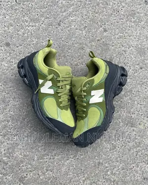 The Basement X New Balance “2002R” Moss Green Sneakers