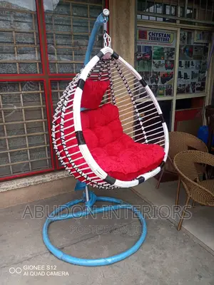 White and Red Swinging Chair