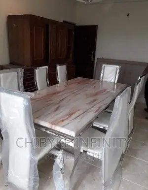 Quality 8-Seater Marble Dining Table With 8-Exotic Chairs