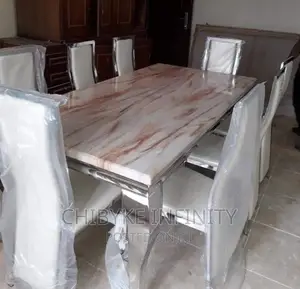 Quality 8-Seater Marble Dining Table With 8-Exotic Chairs