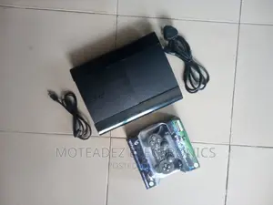 Uk Used Sony Ps3 Super Slim W/Games Installed, Pad Cables