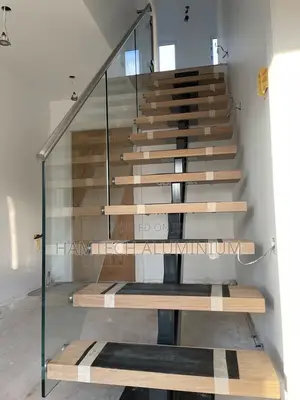 Modern Wooden Staircase With Side Fixed Glass