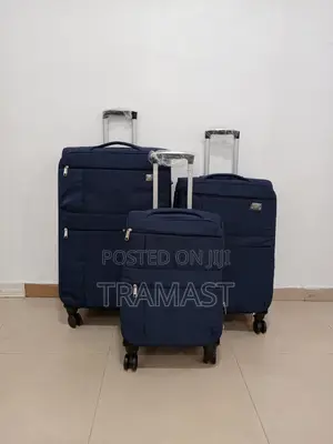 4 Wheel Blue Travels Suitcase