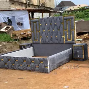 6 by 6 Padded Bed Frame Gray Color Design With Touch of Gold