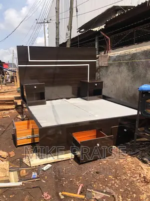 A Quality 6ft by 6ft Bedframe With 2 Bedside Drawer