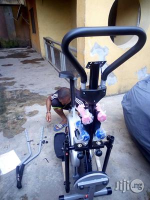 Orbitrack Bike With Twister and Dumbbell