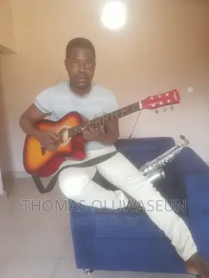 Music Teacher (Saxophone, Keyboard, Guitar and Violin)