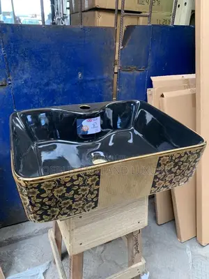 Black and Gold Countertop Basin With Tap Hole