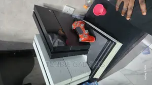 Playstation 4 Fat Console With 2 Pads And 10 Games Installed