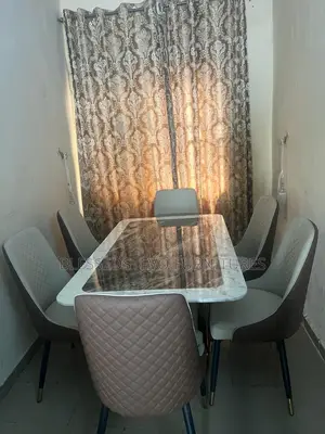 Marble Dining Table With 6 Chair Brown Color