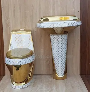 Gold and White Water Closet