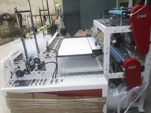 Automatic Nylon Cutting And Sealing Machine With Puncher