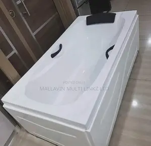 Paneled Bath Tub With Headrest And Side Handles.