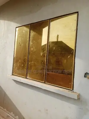 Golden FRAMELESS Window