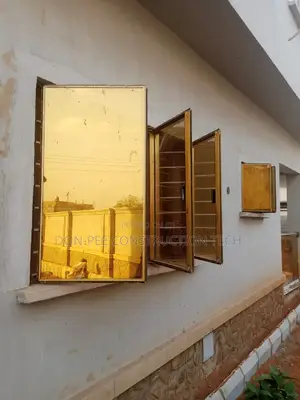 Golden Frameless Window