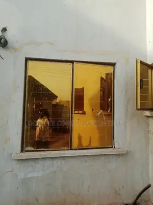 Gold Frameless Window