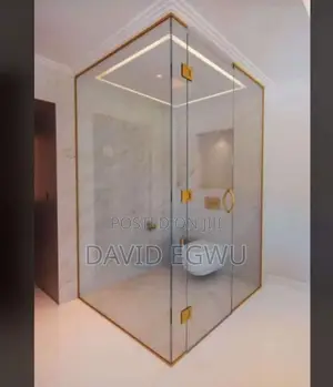 Shower Cubicle With Gold Accessories