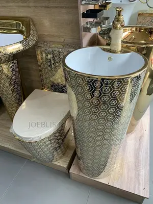 Big Gold Water Closet With Round Basin