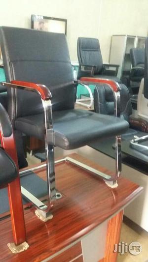 Wooden/Leather Armchairs