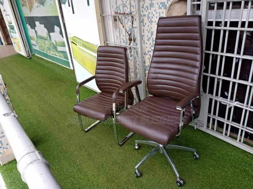Brown Swivel And Leather Visitors Chair