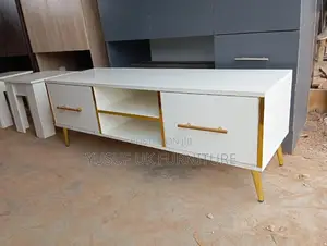 Tv Console With Gold Edges and Gold Legs