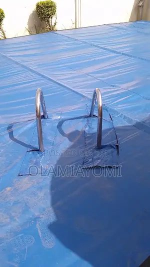 Automated Pool Cover Using Remote and Phone Control