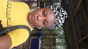 An Experienced Female Tailor