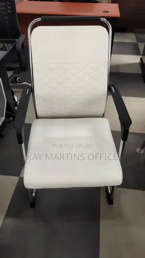 A Unique Visitors White Chair