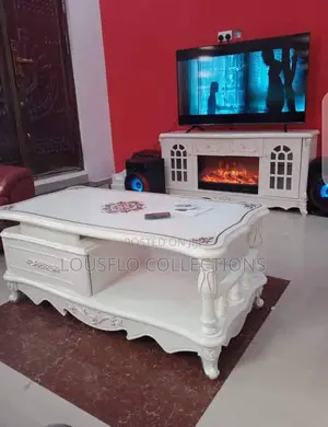 Quality Center Table and Television With Fire  Place