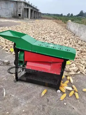 Corn Peeler And Thresher Machine