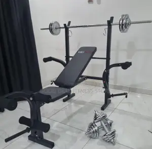 Standard Weight Lifting Bench With 50kg Barbells and Dumbell