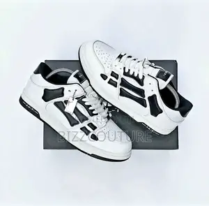 Original Amiri Skel Top Low Sneakers Available in Store