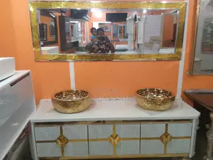 Gold and White Toilet and Bathroom Cabinets