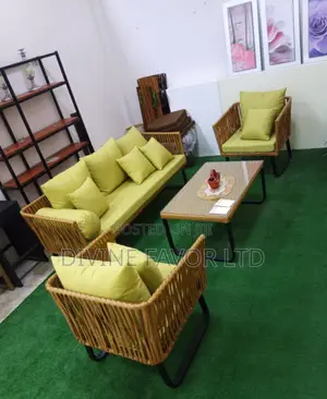 Set of Rattan Sofa With Seat Pads.