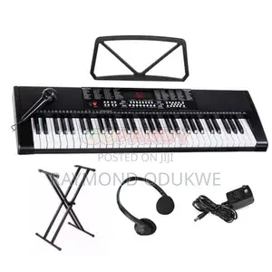 Quality Piano Keyboard With Adapter, Stand and Earphone
