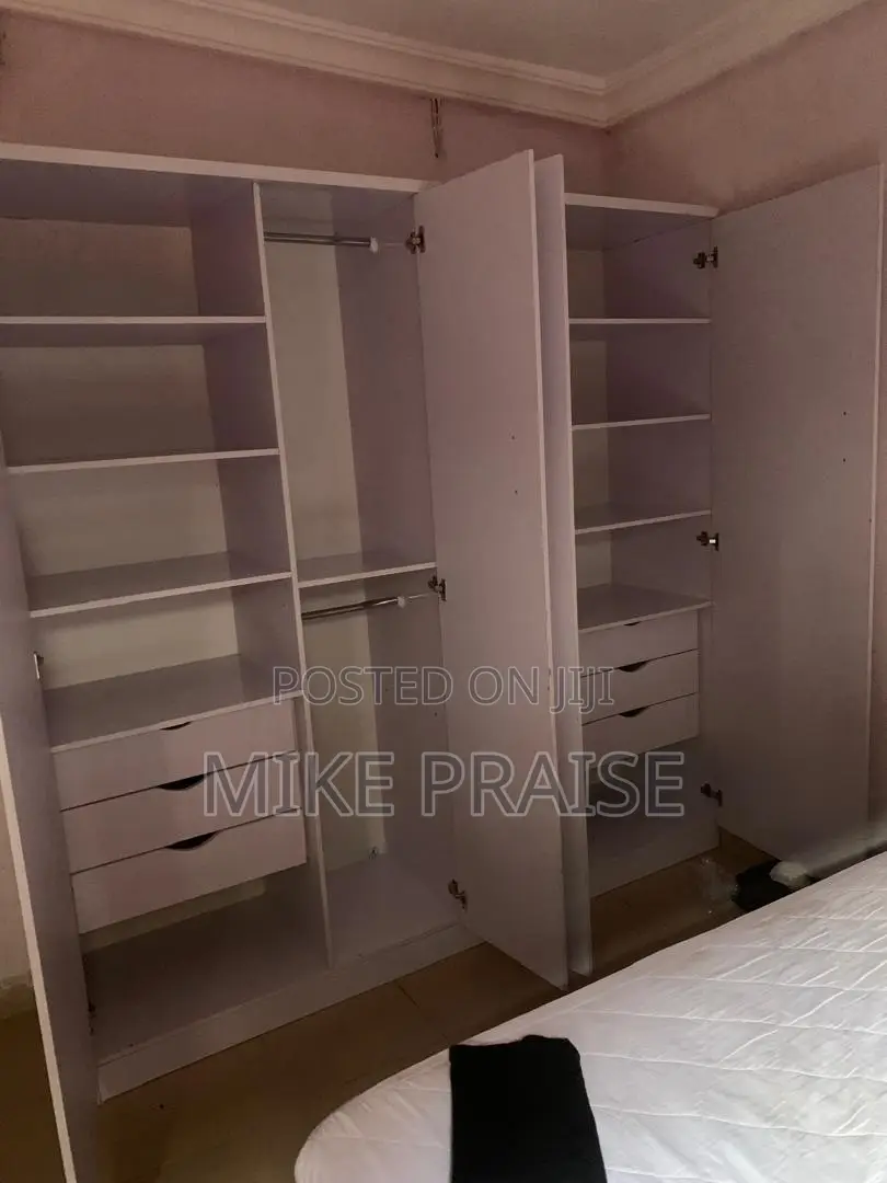 A Quality 7ft by 7ft Wardrobe With Mirror